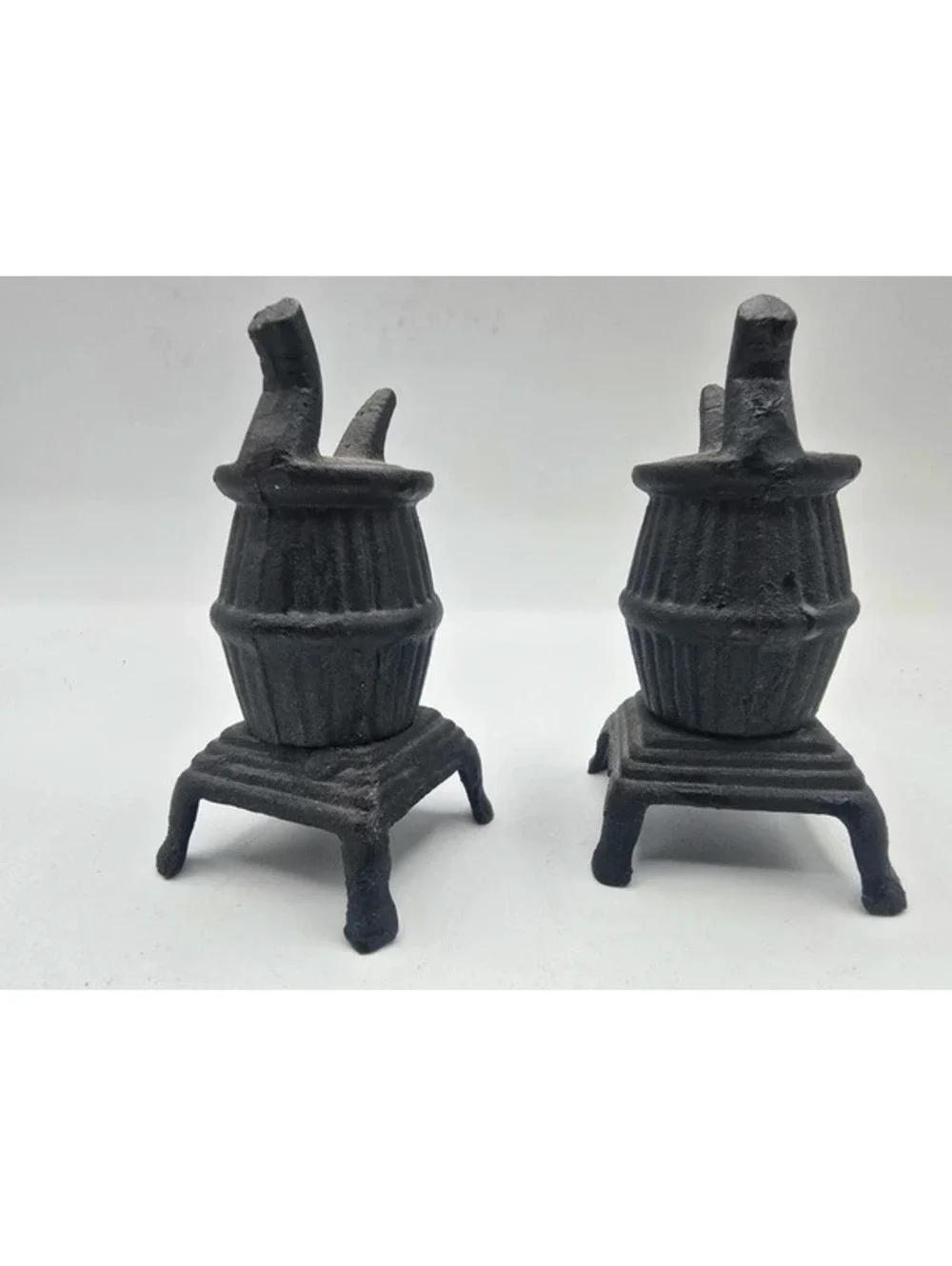 Vintage plastic pot belly stove salt and pepper shakers